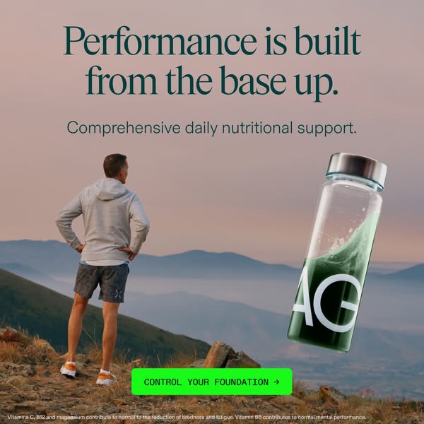 The image ad shows a man looking out at a mountain range with a floating bottle of AG. The ad highlights the product'