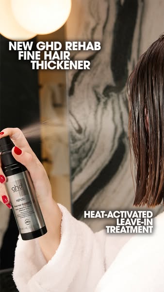 This ad showcases the GHD Rehab Fine Hair Thickener. It features a woman spraying the product on her wet hair, highlight