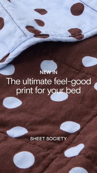 This image ad for Sheet Society features a close-up shot of their new, brown and light blue polka-dot patterned bedding.