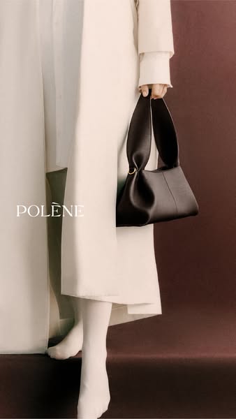 The ad features a handbag from the brand Polène. The image highlights the bag's shape, color, and material, showcasi