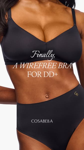 A close-up shot of a woman wearing a Cosabella bra and underwear set, highlighting the wire-free design suitable for DD+