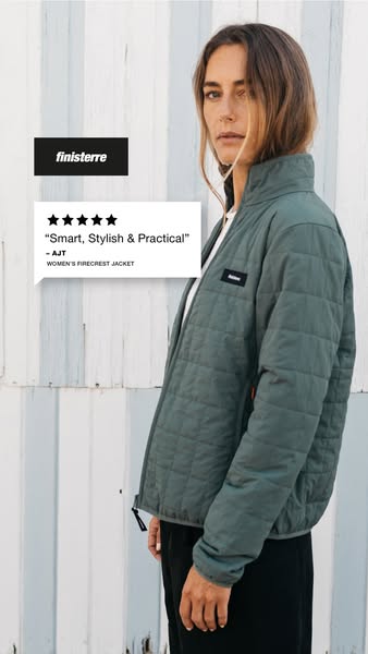 This image ad features a woman wearing the Finisterre Women's Firecrest Jacket. A customer review appears next to th