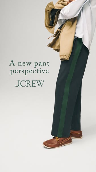 This image ad by J.Crew showcases a new perspective on pants. The ad features a person wearing navy blue pants with a gr