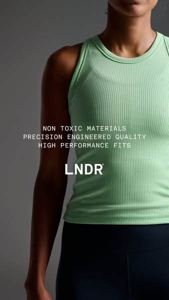 This image ad for LNDR activewear focuses on the quality materials and precision fit of their garments. The ad features 