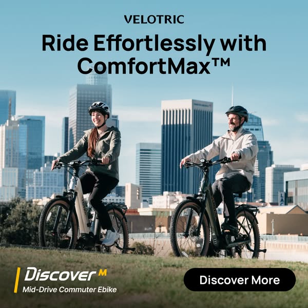 This image ad promotes Velotric's Discover M Mid-Drive Commuter Ebike. It features two people riding the bikes in fr