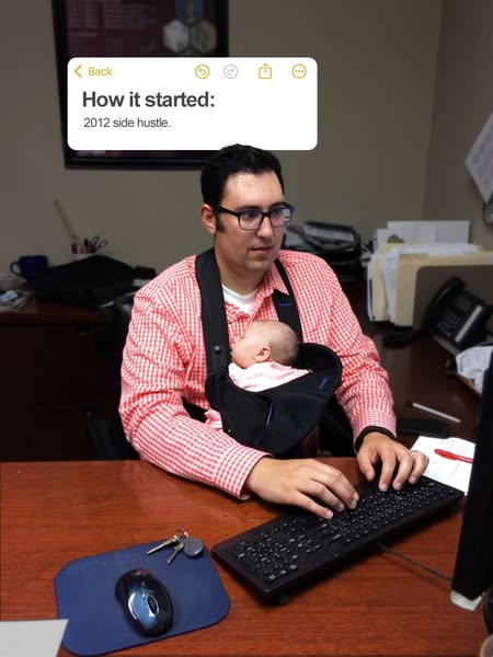 The ad shows a photo from 2012 of a man working at a computer with a baby in a carrier, along with a simulated notes app