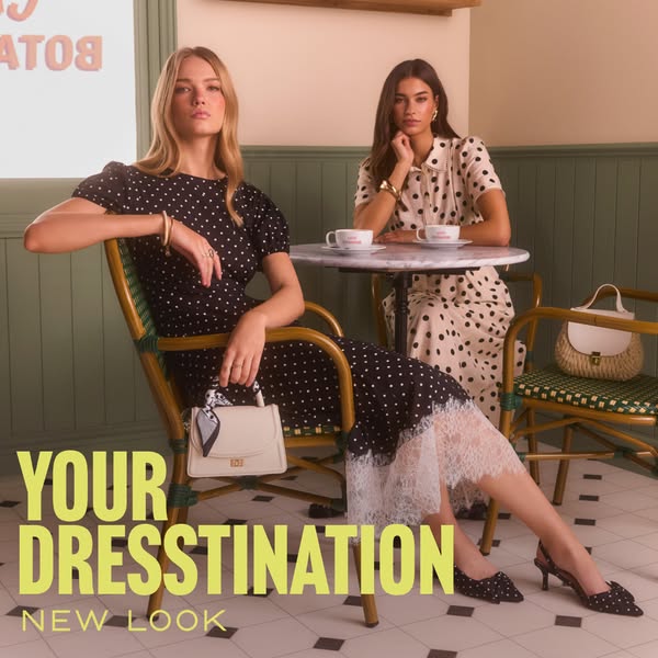An image ad for New Look promotes their dresses. Two women are sitting at a table in dresses sold by New Look. The text 