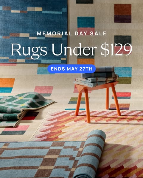 This image ad promotes a Memorial Day Sale, highlighting rugs available for under $129. The ad features an assortment of