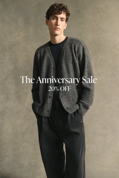 This ad promotes a brand's anniversary sale with a 20% discount. The visual features a person wearing clothing from 