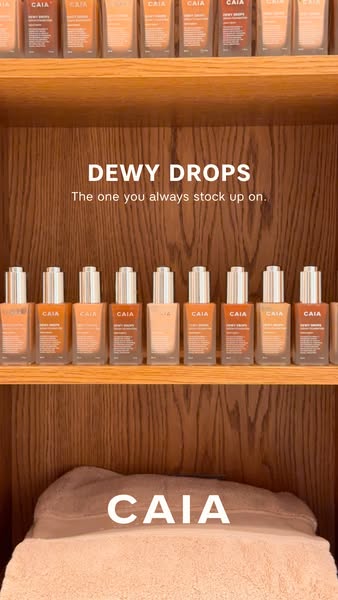 This ad showcases CAIA's Dewy Drops foundation product line, emphasizing its appeal as a must-have item that custome