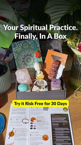 The ad showcases a curated box containing spiritual items like crystals, a journal, and a bracelet. The ad uses text ove