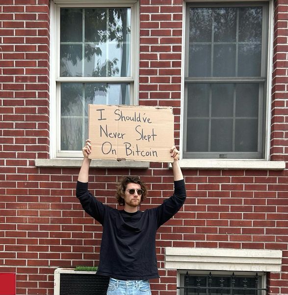 DudewithSign ad