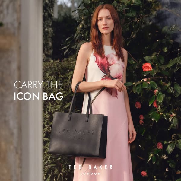 A woman is shown carrying a Ted Baker Icon bag.