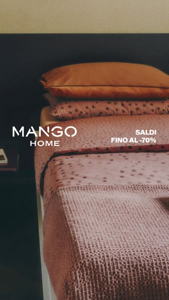 This ad for Mango Home features an image of a bed with bedding and advertises sales of up to 70% off.