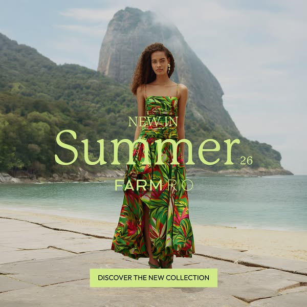 This ad for FARM Rio features a model wearing a long, floral-print dress against a beachside backdrop in Rio de Janeiro.