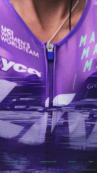 This ad features an up-close shot of a cyclist wearing a purple jersey with team branding. The visual style includes a d