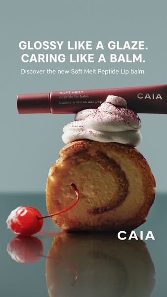 This image ad for CAIA's Soft Melt Peptide Lip Balm features an artful arrangement of the lip balm tube balanced on 