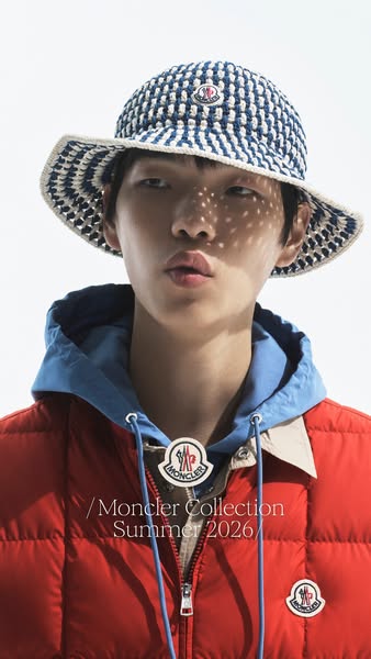 This ad features a young Asian man wearing Moncler clothing to promote the brand's summer 2026 collection.