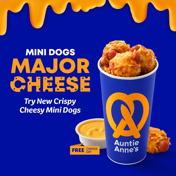 An image ad for Auntie Anne's new Crispy Cheesy Mini Dogs, served with a free cheese dip.