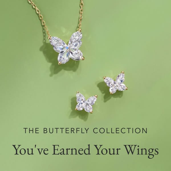 This image ad showcases a set of butterfly-shaped jewelry, including a necklace and earrings. The ad is positioned to ap