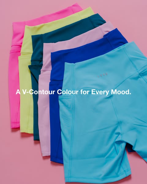 An ad displaying a range of color options for V-Contour activewear shorts.