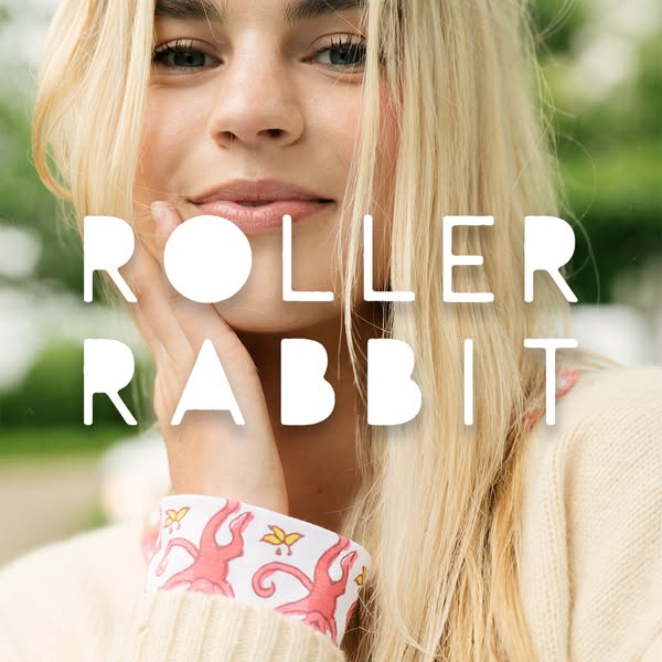 This ad features a close-up shot of a fair-skinned young woman, possibly in her late teens or early twenties, with flowi