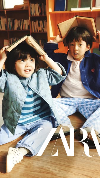 This image ad for ZARA clothing features two young children in a library setting, wearing clothing from the brand. They 