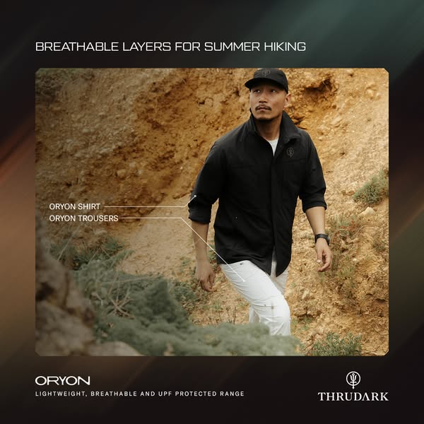 This image ad showcases ThruDark's Oryon shirt and trousers, highlighting their suitability for summer hiking. The b