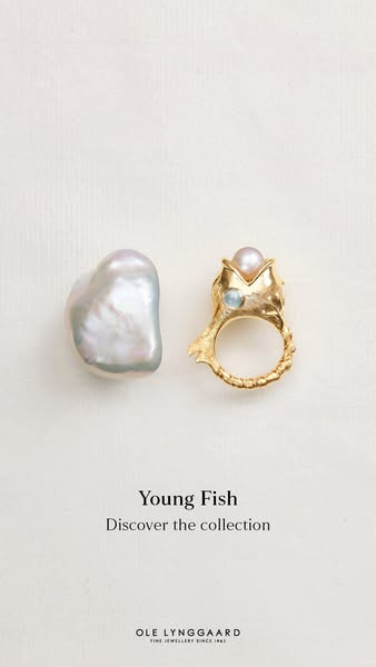 A still image ad for Ole Lynggaard fine jewelry featuring the brand's Young Fish collection.