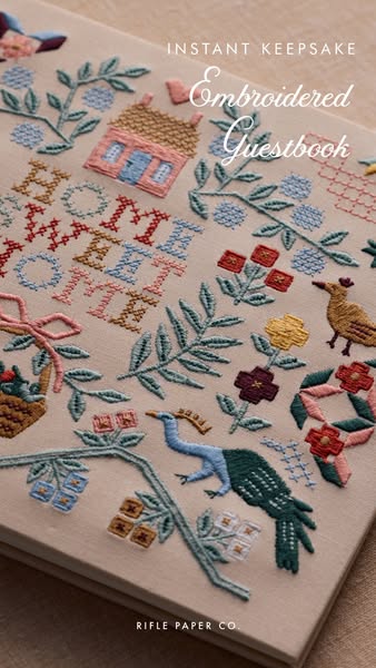 This ad showcases the Embroidered Guestbook by Rifle Paper Co., highlighting its unique design and appeal as an instant 