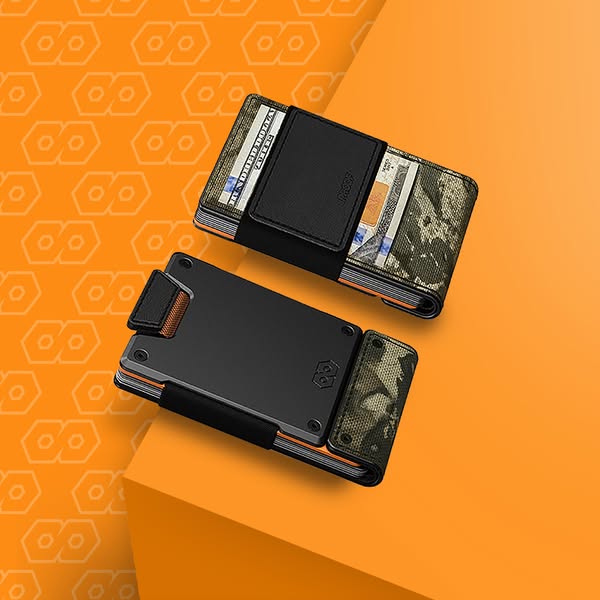 This ad displays two Ridge wallets. The top wallet is filled with cash and has a black leather money clip with a camo wr