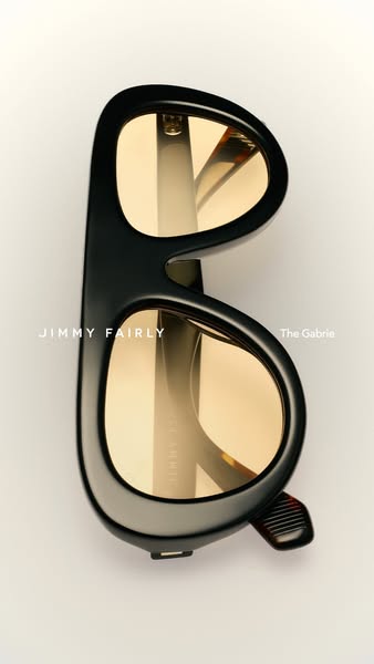 This ad features a close-up shot of Jimmy Fairly sunglasses, highlighting their design and brand.