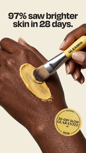 This image ad for Gleamin features a hand applying a yellow face mask with a brush. The ad highlights a clinical claim a