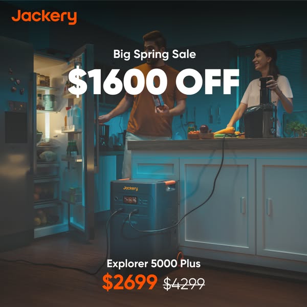 An indoor shot shows a kitchen where a man is opening the refrigerator and a woman is using a blender, while a Jackery E