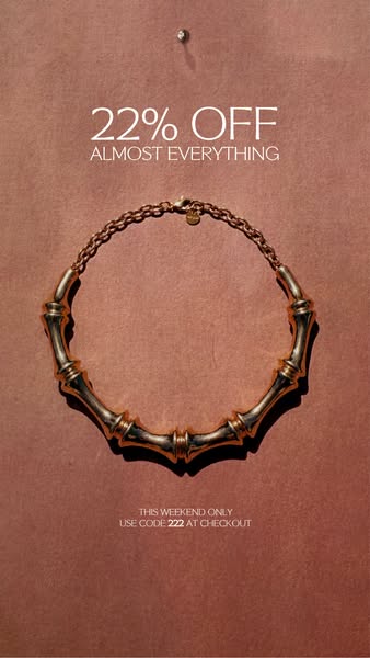 This ad is advertising a 22% off sale for almost everything. The ad features a gold necklace set against a monochromatic