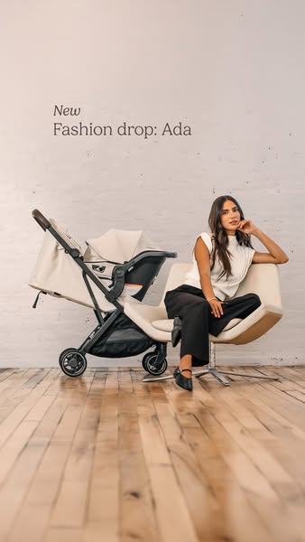 This image ad showcases a stroller and car seat set in a studio environment, alongside a woman in fashionable business c