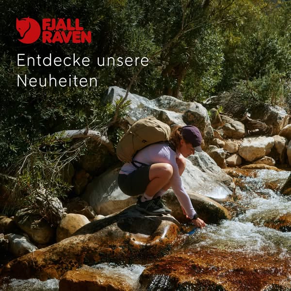 This ad from Fjallraven shows a woman on a hike near a stream. She is replenishing her water bottle from the stream whil