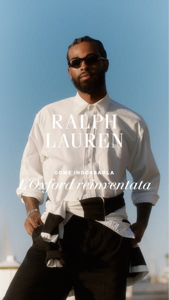 This Ralph Lauren ad presents a model wearing a white Oxford shirt with a black and white striped sweater tied around hi