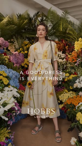 This image ad features a woman in a dress, surrounded by flowers. The ad's headline reads, "A good dress is eve
