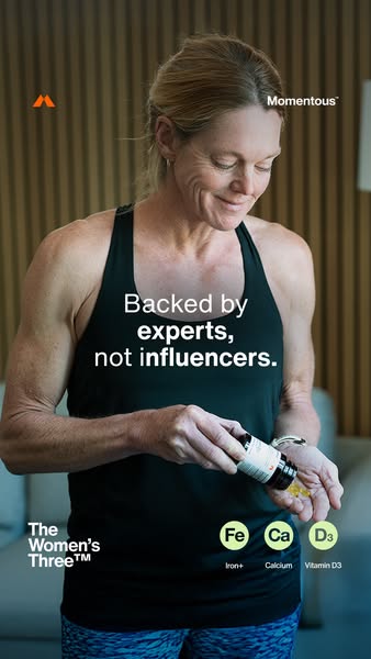 This image ad for Momentous features a woman holding the brand's 'The Women's Three' supplement, highlig