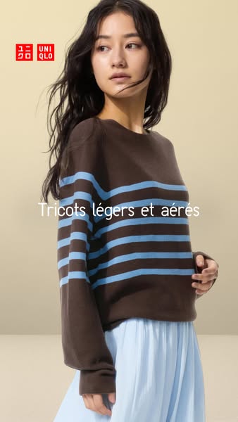 A woman is wearing a brown and blue striped sweater with a blue skirt, promoting lightweight knits.