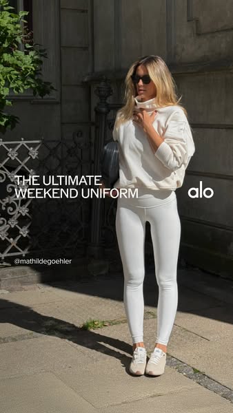 This ad showcases Alo Yoga apparel as the perfect weekend uniform. It features a model wearing a matching set of Alo leg