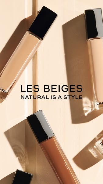 This image ad showcases Chanel's Les Beiges makeup line with a focus on natural style, featuring several bottles of 