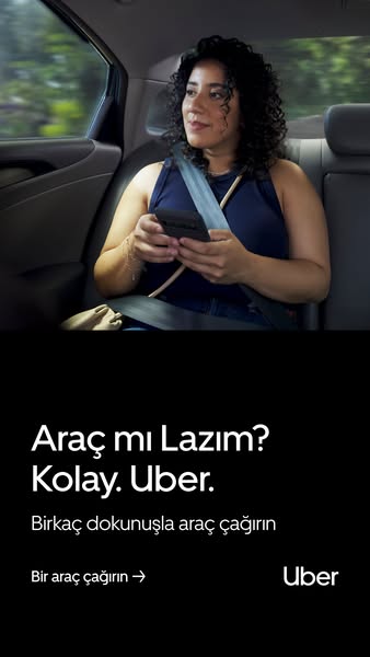 An Uber ad shows a woman sitting in the backseat of a car, looking out the window, and using her phone. The ad promotes 