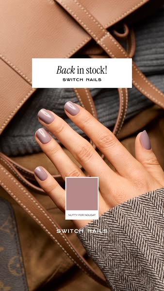 This image ad for Switch Nails features a hand with mauve-colored press-on nails, along with the text "Back in stoc