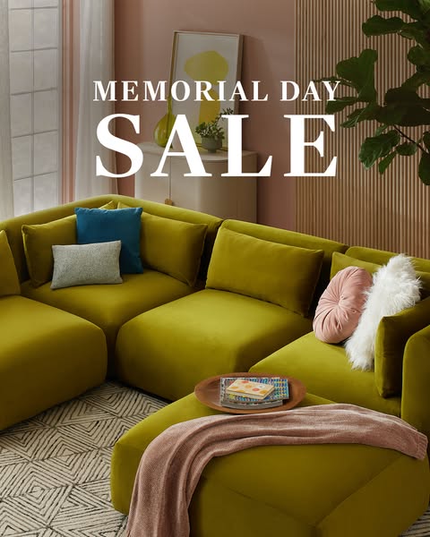 This ad showcases a green sectional couch and advertises a Memorial Day Sale.