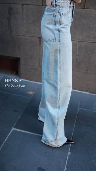 This ad features Henne's The Zeva Jean, a wide-leg, light-wash jean, highlighted in a lifestyle shot.