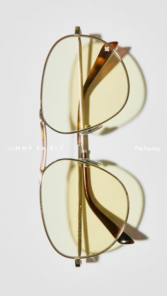 A product ad featuring a pair of Jimmy Fairly sunglasses.