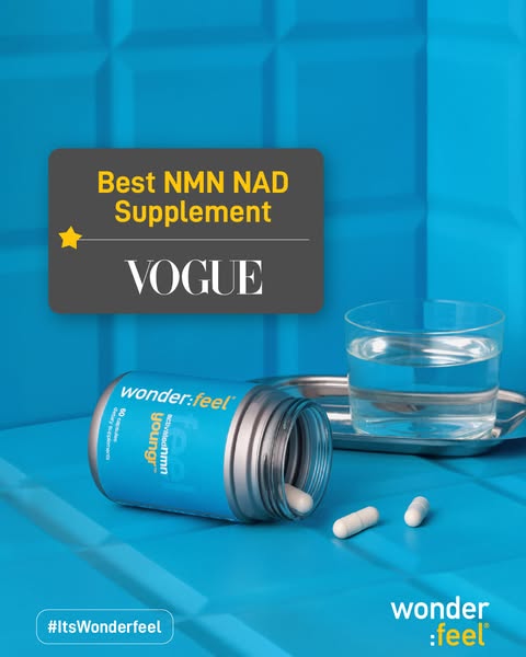 An image promoting Wonderfeel supplements. It features a product bottle, two loose capsules, and a glass of water on a b