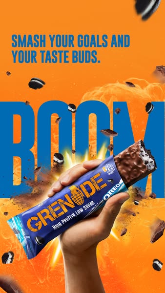 This ad promotes Grenade's Oreo-flavored protein bar. It features a hand holding the bar against an explosive orange